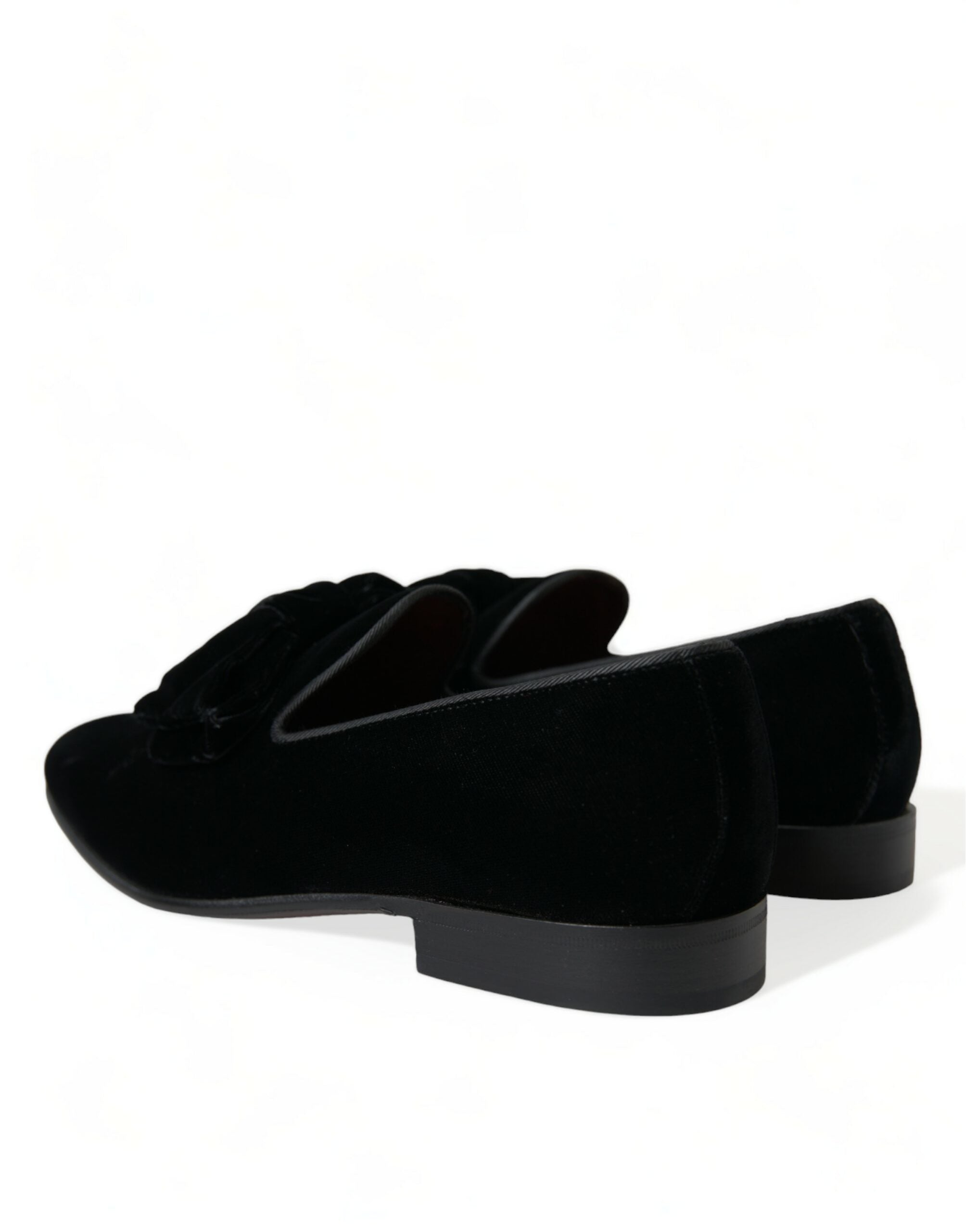 Black velvet loafers by Dolce & Gabbana, formal dress shoes with sleek design and elegant craftsmanship.