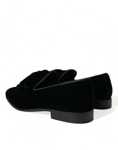 Black velvet loafers by Dolce & Gabbana, formal dress shoes with sleek design and elegant craftsmanship.