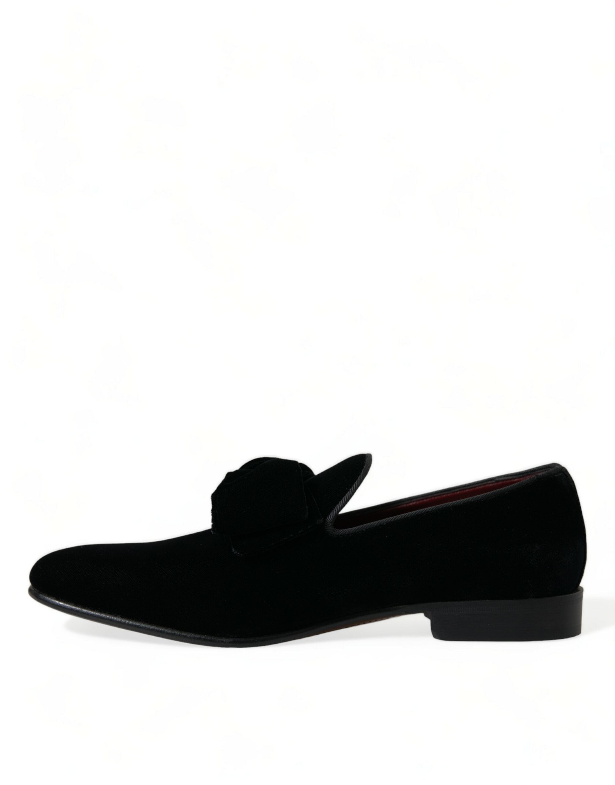 Black velvet loafers by Dolce & Gabbana, formal dress shoes with sleek design and polished finish, perfect for elegant occasions.