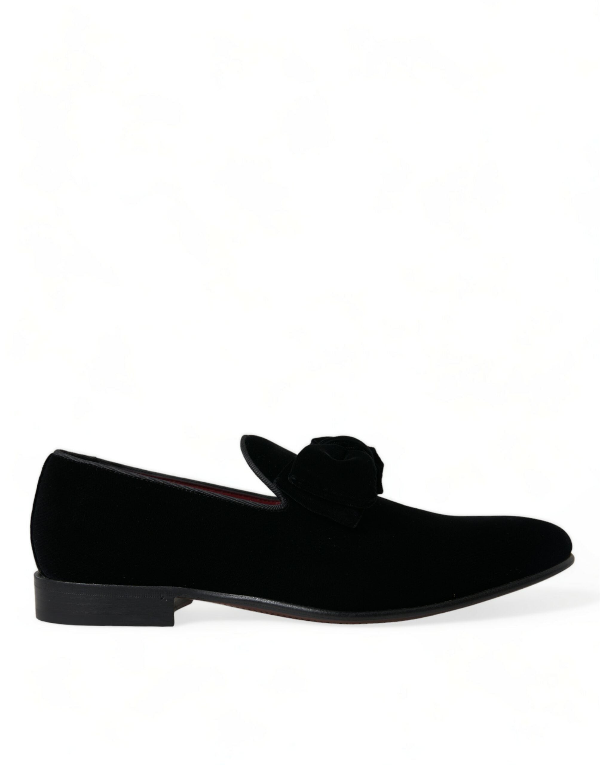 Black velvet loafers by Dolce & Gabbana, formal dress shoes with sleek design and polished finish, perfect for elegant occasions.