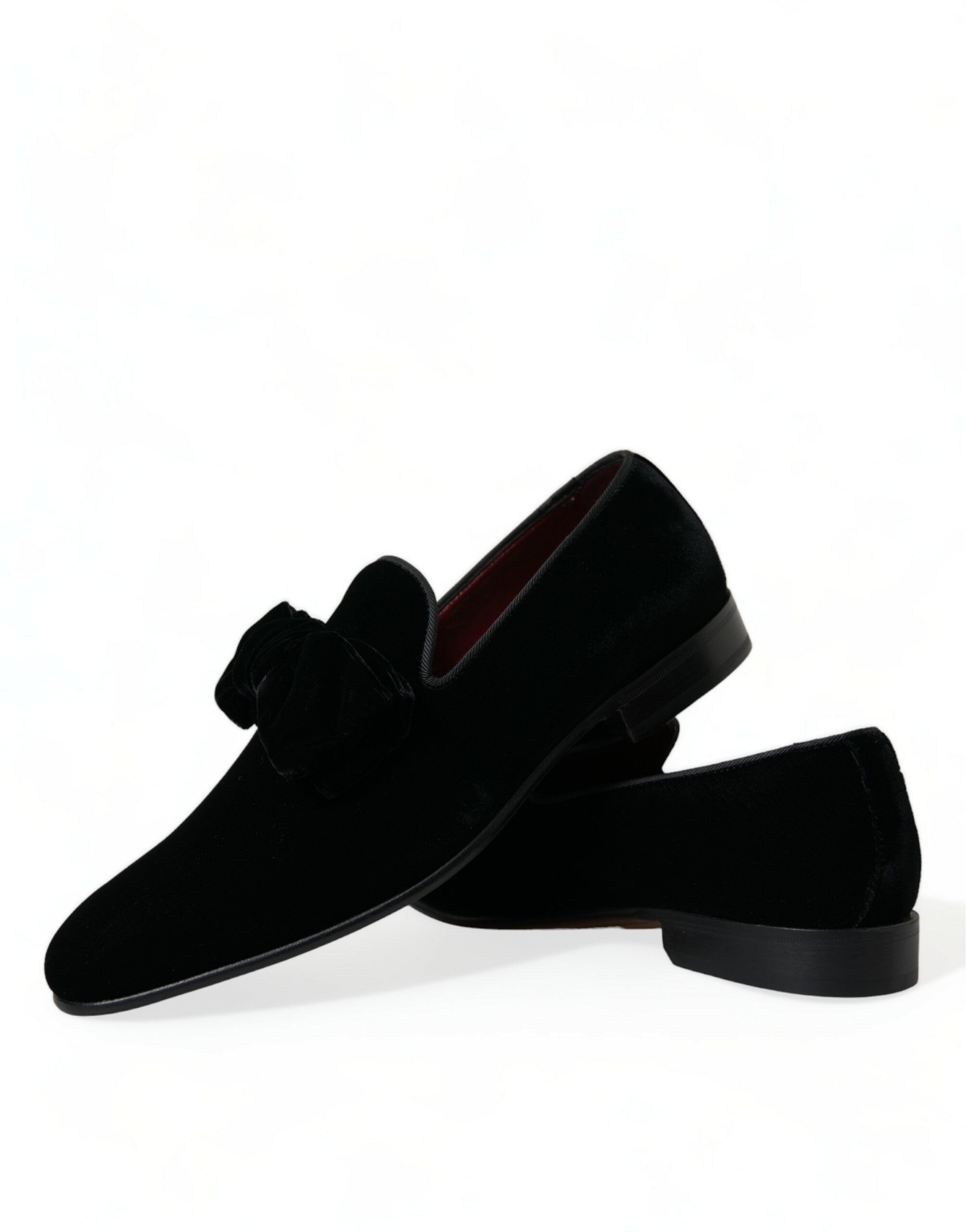 Black velvet loafers by Dolce & Gabbana, formal dress shoes with sleek design and pointed toe, perfect for elegant occasions.