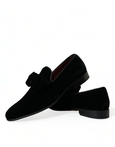 Black velvet loafers by Dolce & Gabbana, formal dress shoes with sleek design and pointed toe, perfect for elegant occasions.