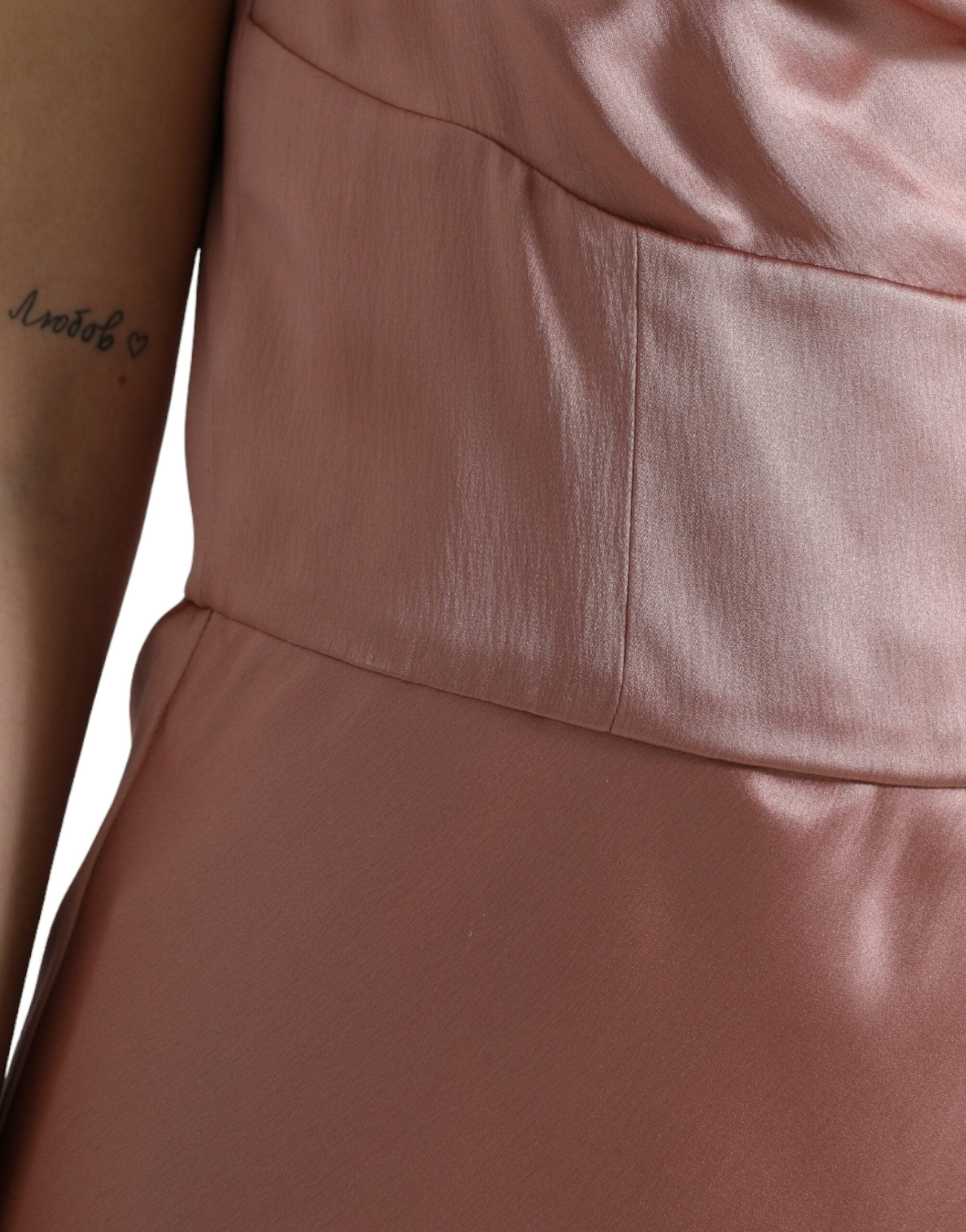 Pink silk spaghetti strap long gown dress by Dolce & Gabbana, flowing fabric with a sleek, elegant silhouette.