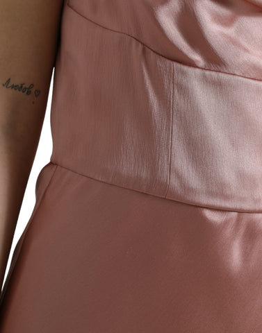 Pink silk spaghetti strap long gown dress by Dolce & Gabbana, flowing fabric with a sleek, elegant silhouette.