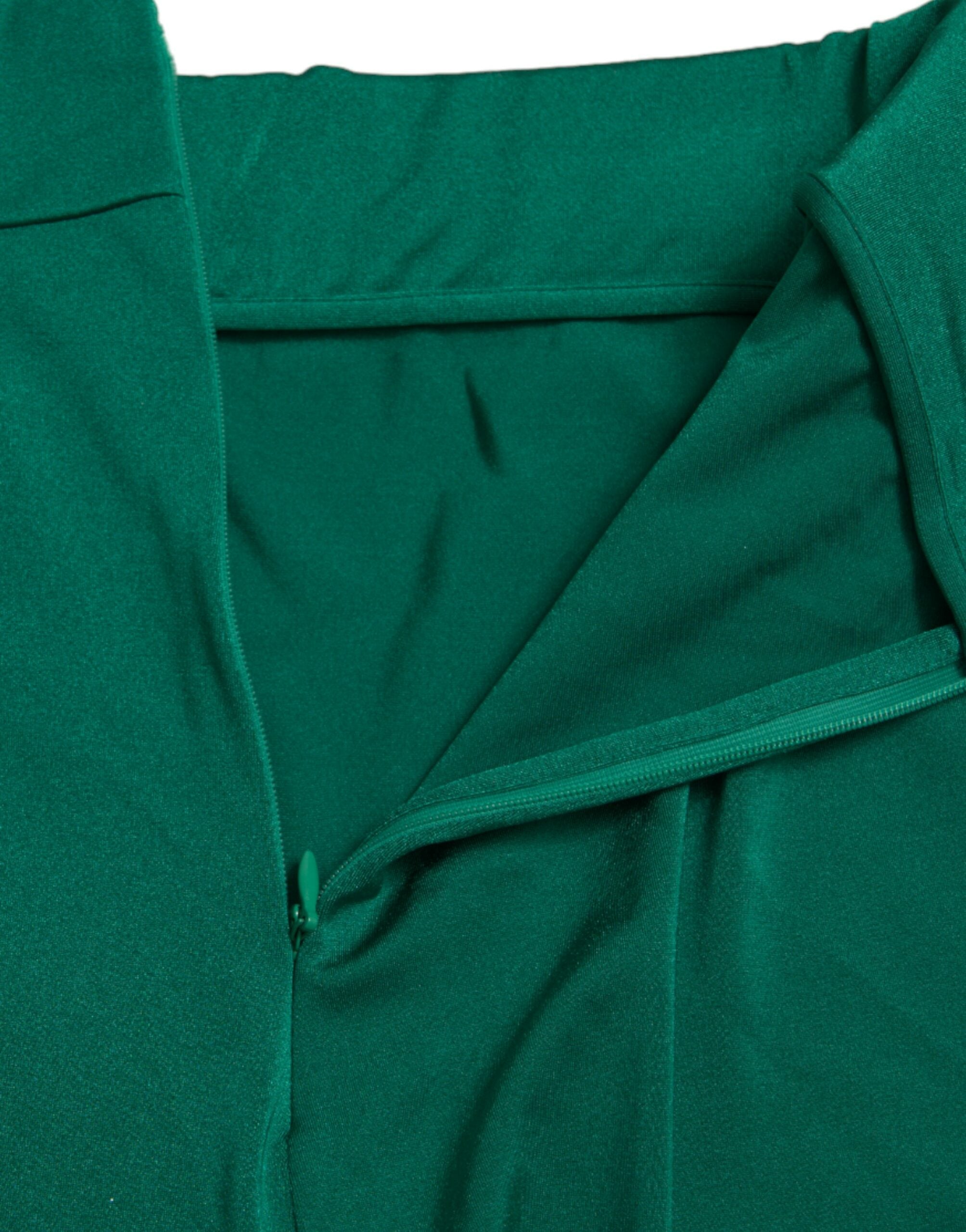 Green nylon stretch slim legging pants by Dolce & Gabbana featuring a fitted, modern design and smooth fabric appearance.