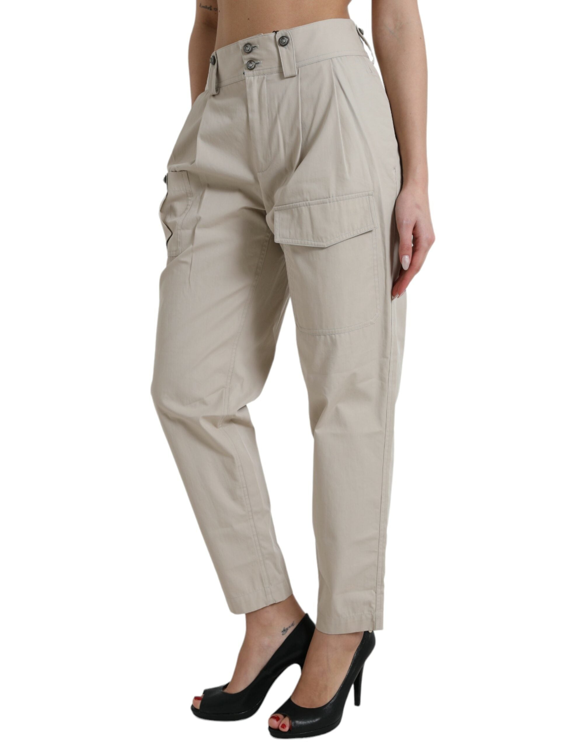 Beige cotton high-waist tapered pants by Dolce & Gabbana, shown on a model, featuring a stylish fit and clean design.