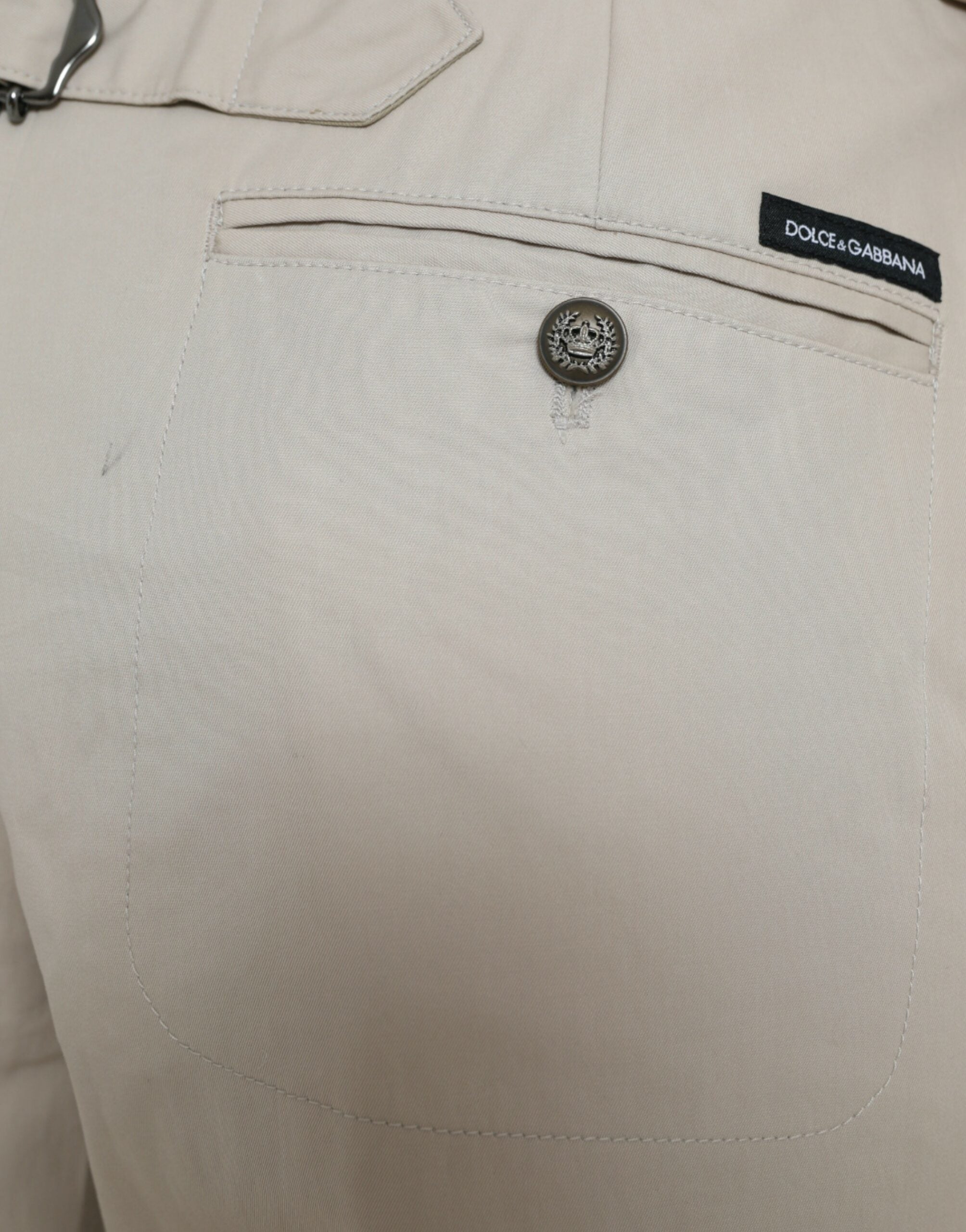 Beige cotton high-waist tapered pants by Dolce & Gabbana, showing front view with belt loops and tailored fit.
