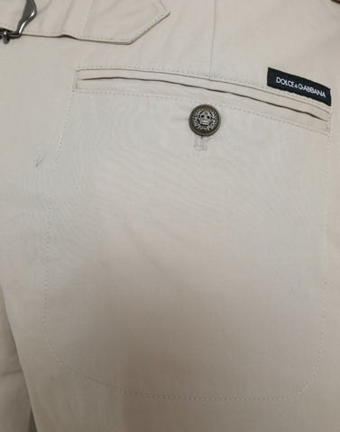 Beige cotton high-waist tapered pants by Dolce & Gabbana, showing front view with belt loops and tailored fit.