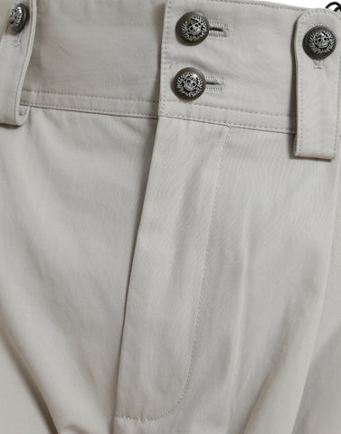 Beige cotton high waist tapered pants by Dolce & Gabbana, showing tailored fit and soft fabric details.