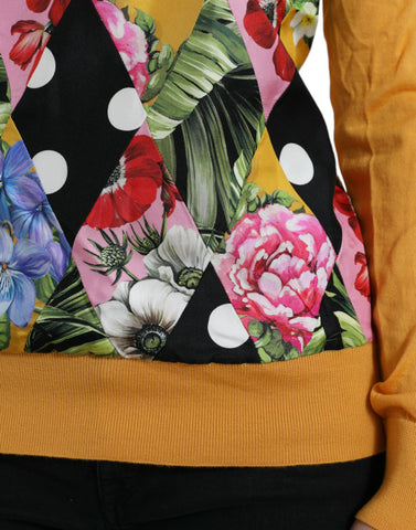 Multicolor patchwork cashmere Henley sweater by Dolce & Gabbana featuring a button-up neckline and vibrant knit design.