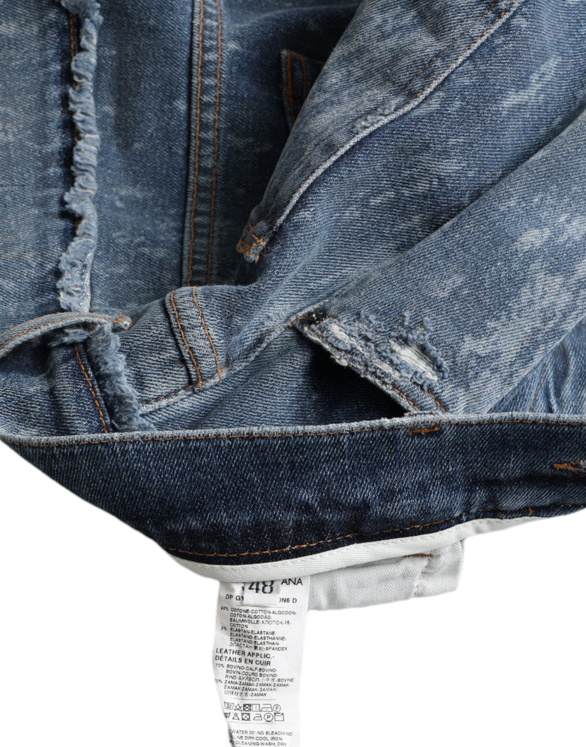 Blue washed skinny cotton stretch denim jeans by Dolce & Gabbana, showing a close-up of fitted design and classic denim texture.