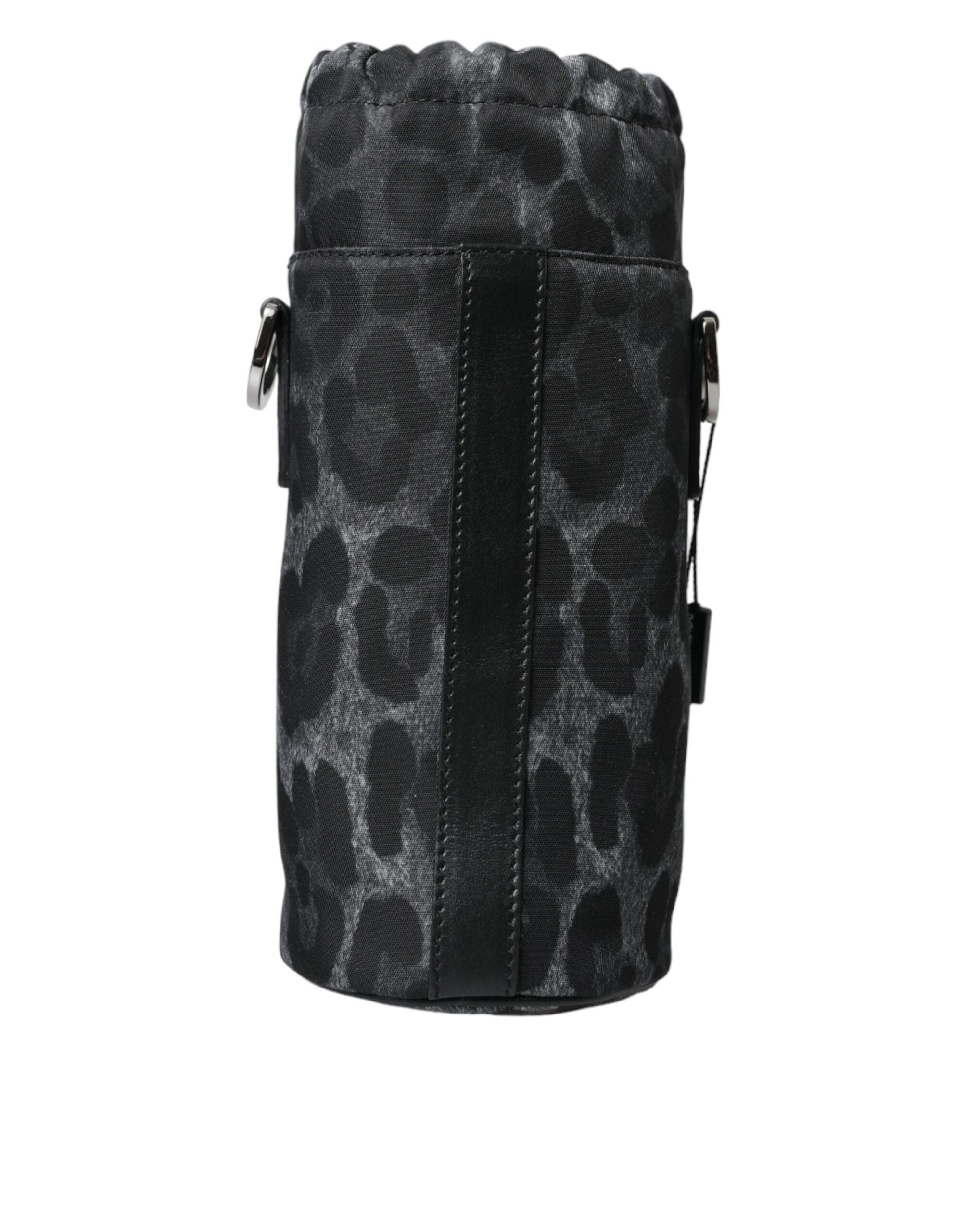 Black leopard print round slim tote bottle cage bag by Dolce & Gabbana, featuring a compact and stylish design with a top handle.