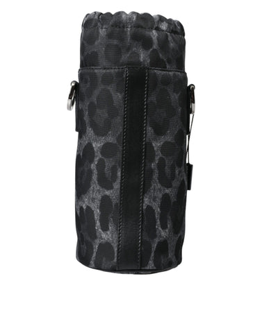 Black leopard print round slim tote bottle cage bag by Dolce & Gabbana, featuring a compact and stylish design with a top handle.