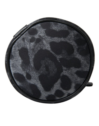 Black leopard print Dolce & Gabbana round slim tote bottle cage bag with top handle and gold-tone hardware.