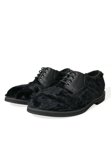 Black fur leather lace-up derby dress shoes by Dolce & Gabbana with sleek design and polished finish.