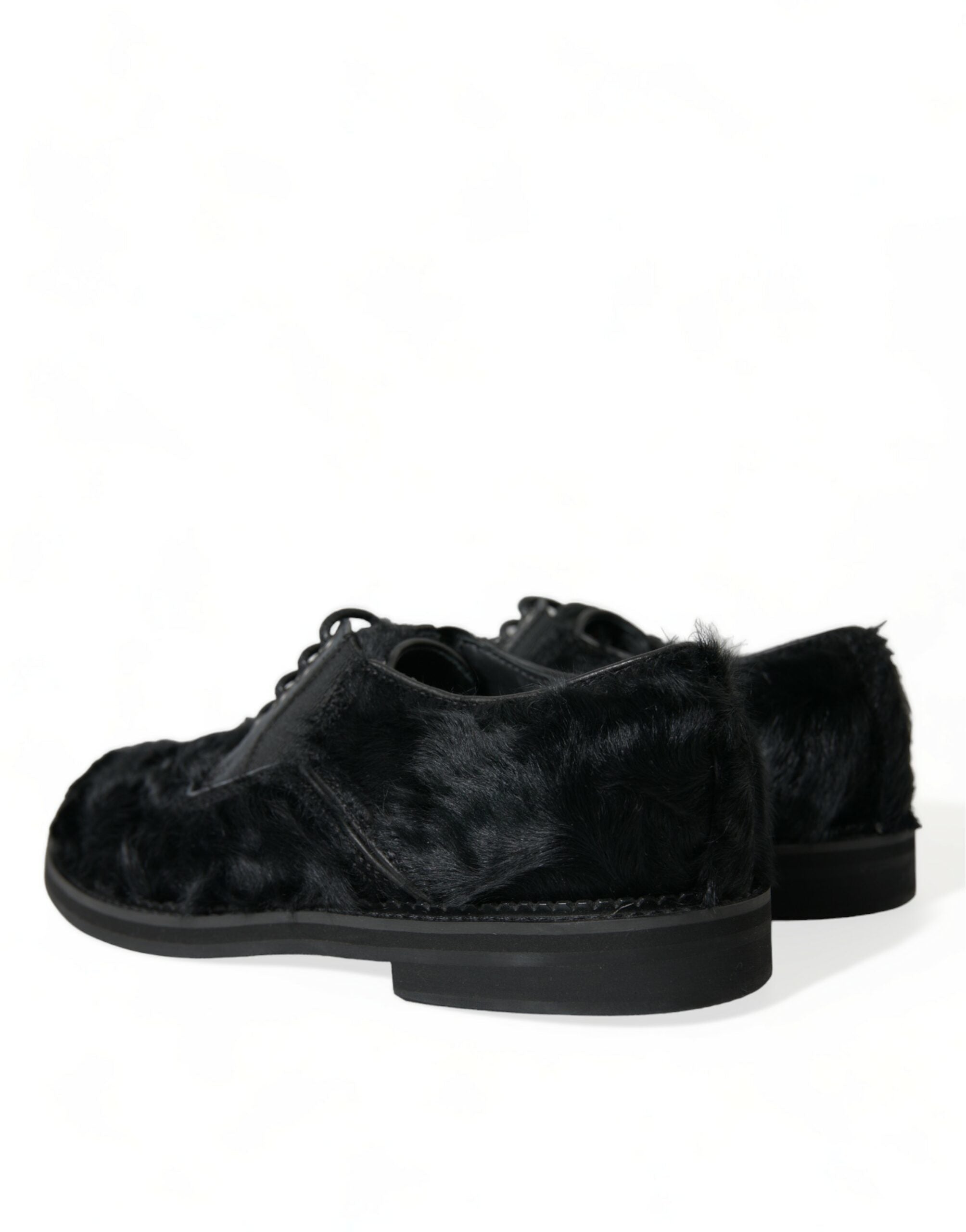 Black fur leather lace-up derby dress shoes by Dolce & Gabbana with sleek design and polished finish.