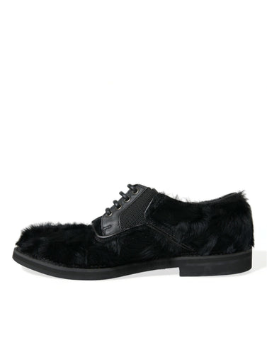 Black fur leather lace-up derby dress shoes by Dolce & Gabbana, featuring sleek design and polished finish.