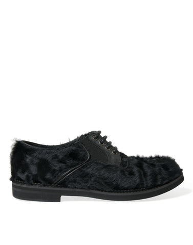 Black fur leather lace-up derby dress shoes by Dolce & Gabbana with sleek design and polished finish.
