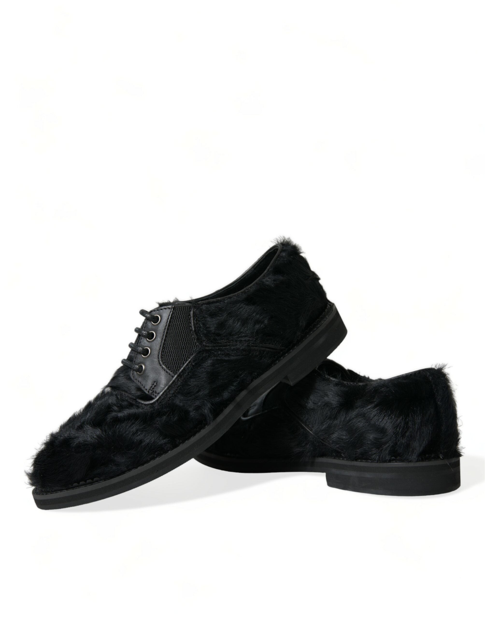 Black fur leather lace-up derby dress shoes by Dolce & Gabbana with detailed stitching and sleek design.