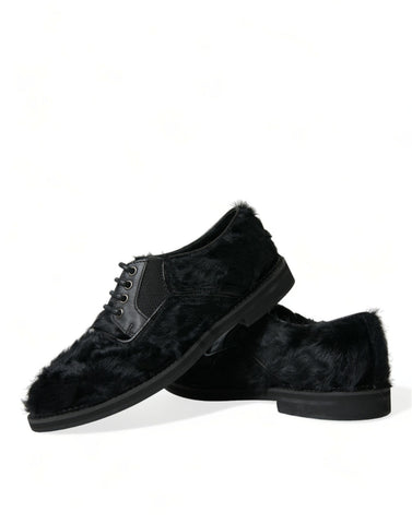 Black fur leather lace-up derby dress shoes by Dolce & Gabbana with detailed stitching and sleek design.