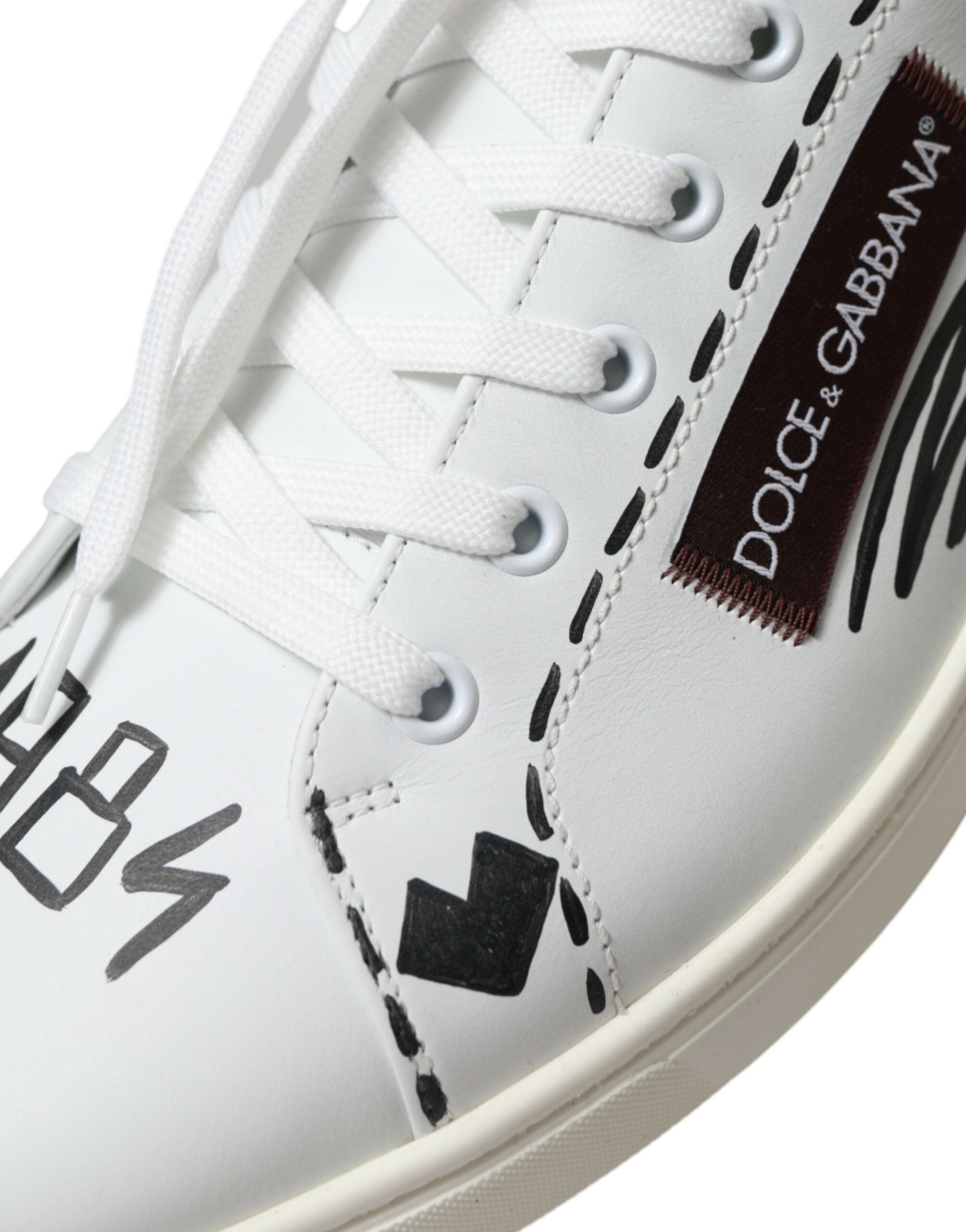 White Bordeaux leather low top sneakers with Dolce & Gabbana logo on the side, casual footwear for men.