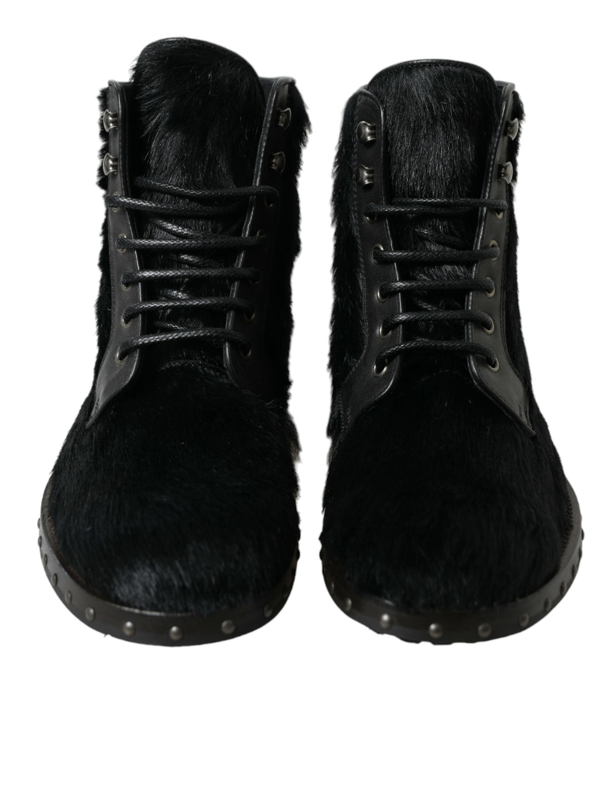 Black pony style leather mid calf boots by Dolce & Gabbana, showcasing sleek design and stylish ankle-high footwear.