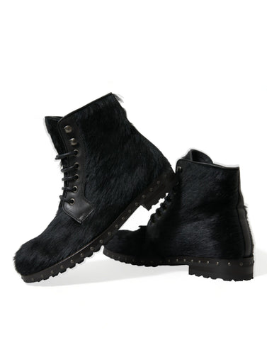 Black pony style leather mid-calf boots by Dolce & Gabbana, featuring sleek design and pointed toe, perfect for stylish fall outfits.