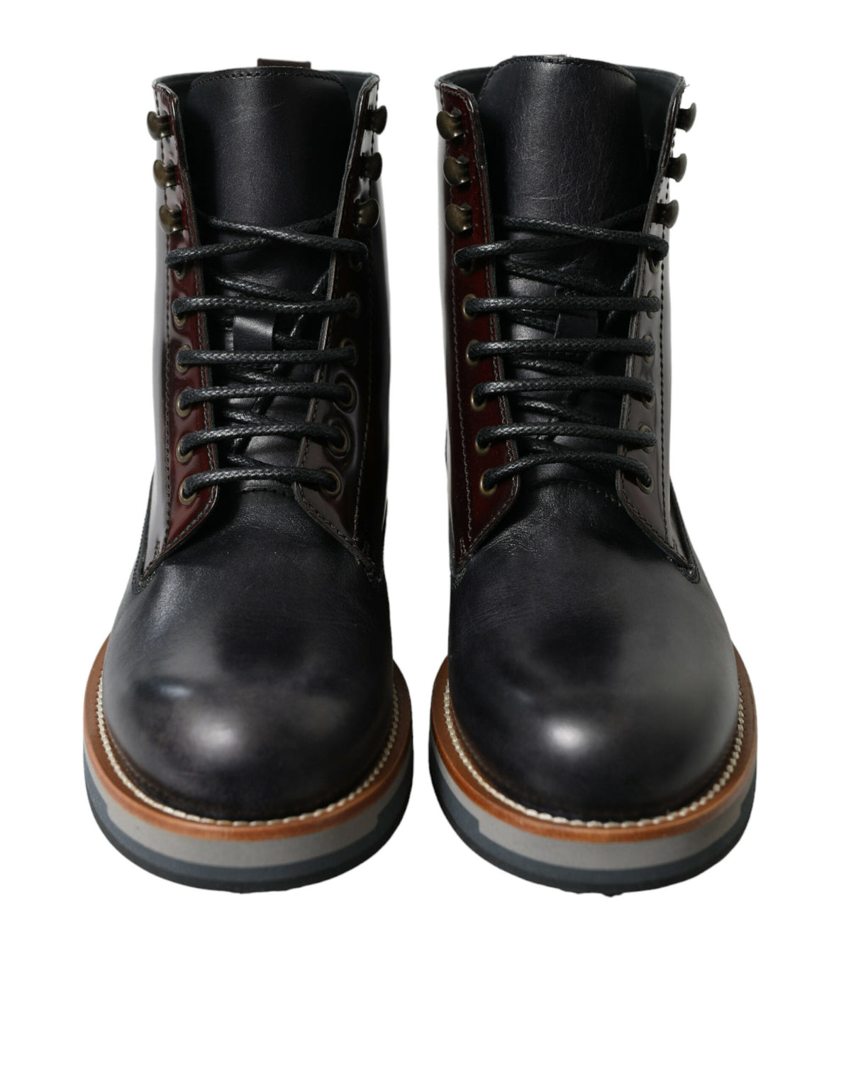Black leather military combat boots by Dolce & Gabbana with rugged design and sturdy laces, suitable for stylish rugged footwear.