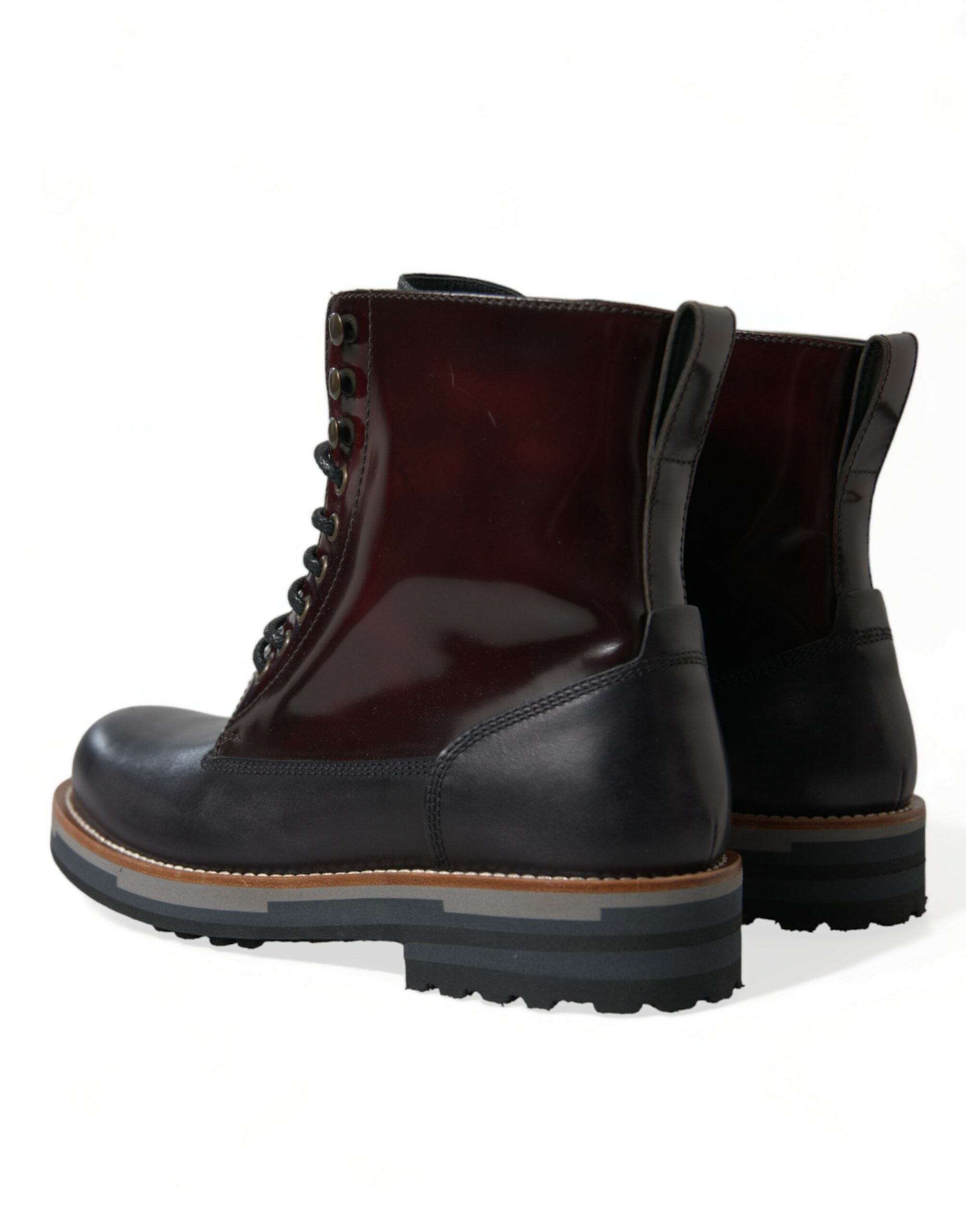 Black leather military combat boots by Dolce & Gabbana, featuring rugged design and sturdy soles.