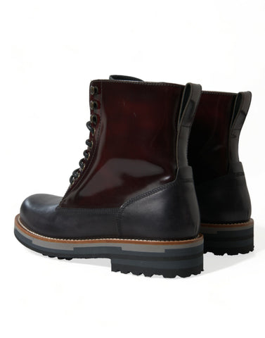 Black leather military combat boots by Dolce & Gabbana, featuring rugged design and sturdy soles.