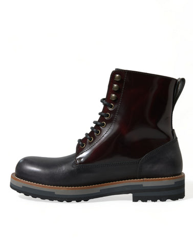 Black leather military combat boots by Dolce & Gabbana featuring rugged design and sturdy soles.