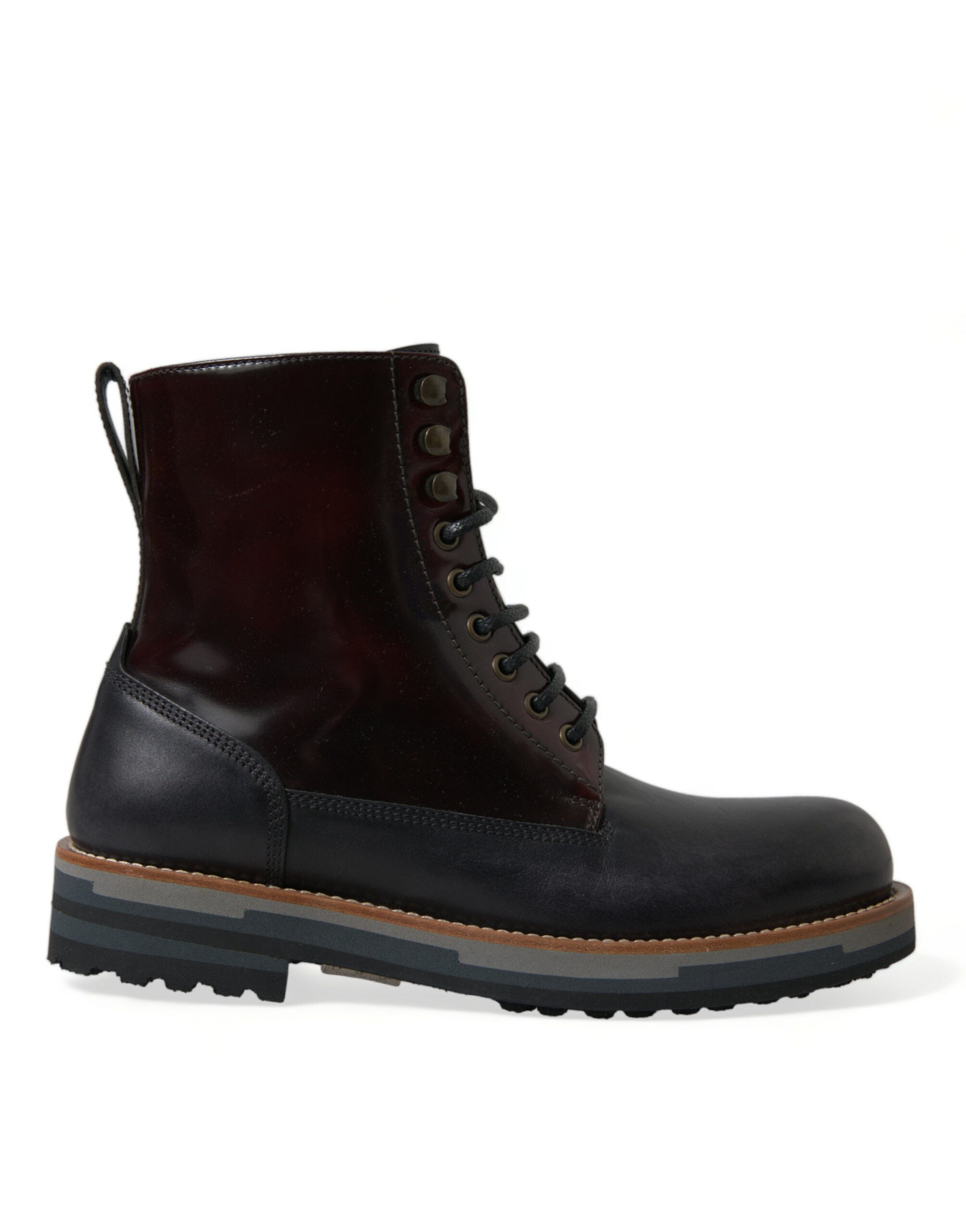 Black leather military combat boots by Dolce & Gabbana, featuring rugged design and sturdy laces, shown from the front view.