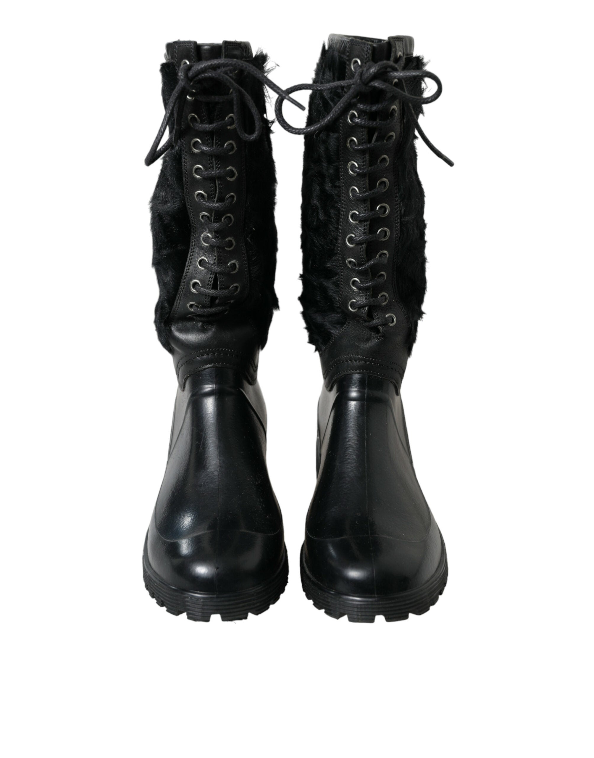 Black rubber lace-up shearling rain boots by Dolce & Gabbana with sturdy soles and cozy shearling lining.