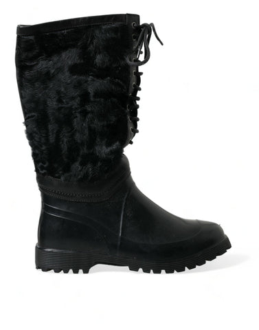 Black rubber lace-up rain boots with shearling lining from Dolce & Gabbana, featuring sturdy soles and waterproof design.