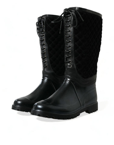 Black Chioggia rubber suede rain boots by Dolce & Gabbana, showcasing waterproof footwear with sleek suede detailing and sturdy soles.