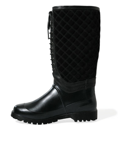 Black Chioggia rubber suede rain boots by Dolce & Gabbana with slip-on design and textured suede finish.