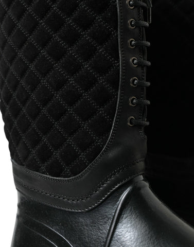 Black Dolce & Gabbana Chioggia rubber suede rain boots with a sleek design and sturdy soles.