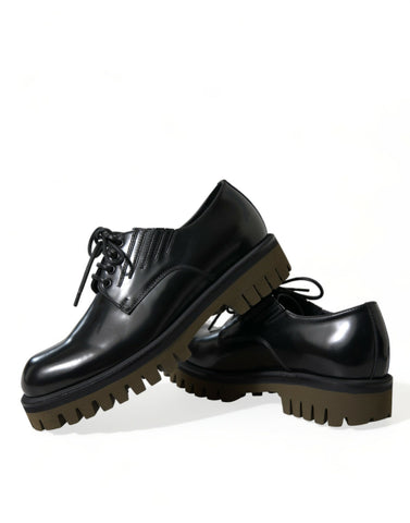 Black leather lace-up derby shoes for men by Dolce & Gabbana, featuring classic design and polished finish.