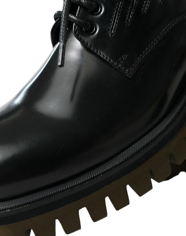 Black leather lace-up derby men's dress shoes by Dolce & Gabbana, featuring sleek design and polished finish.