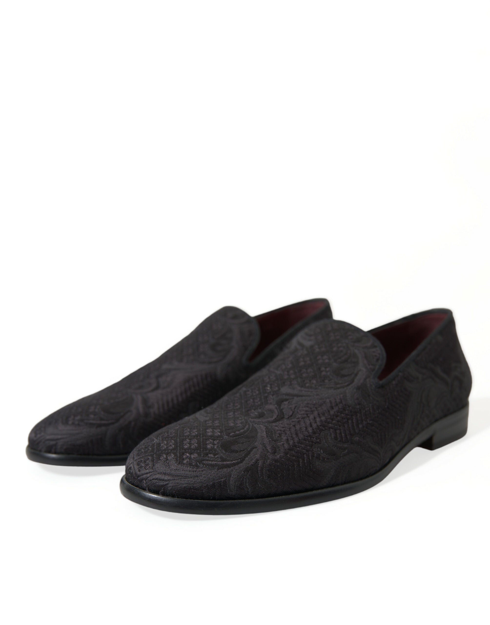 Black brocade men slip-on loafer dress shoes by Dolce & Gabbana with a stylish, textured design and sleek slip-on style.
