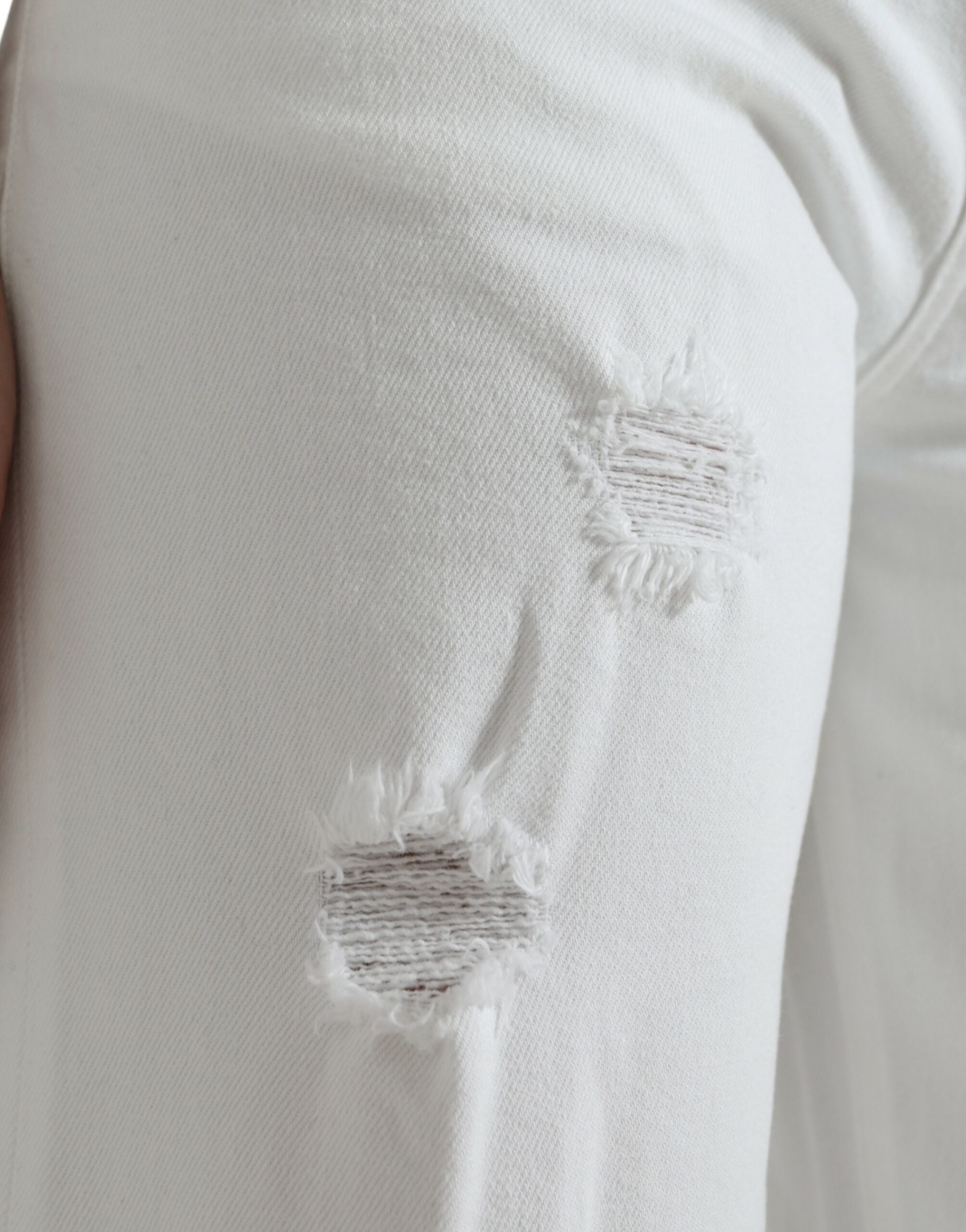 White cotton cropped wide-leg denim jeans by Dolce & Gabbana, showcasing a relaxed fit and stylish design.