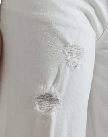 White cotton cropped wide-leg denim jeans by Dolce & Gabbana, showcasing a relaxed fit and stylish design.