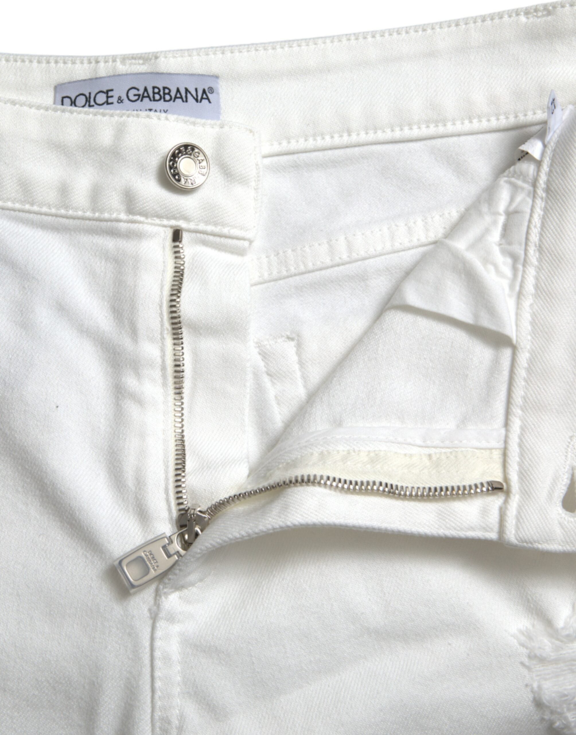 White cotton cropped wide-leg denim jeans by Dolce & Gabbana, showing the relaxed fit and stylish design.