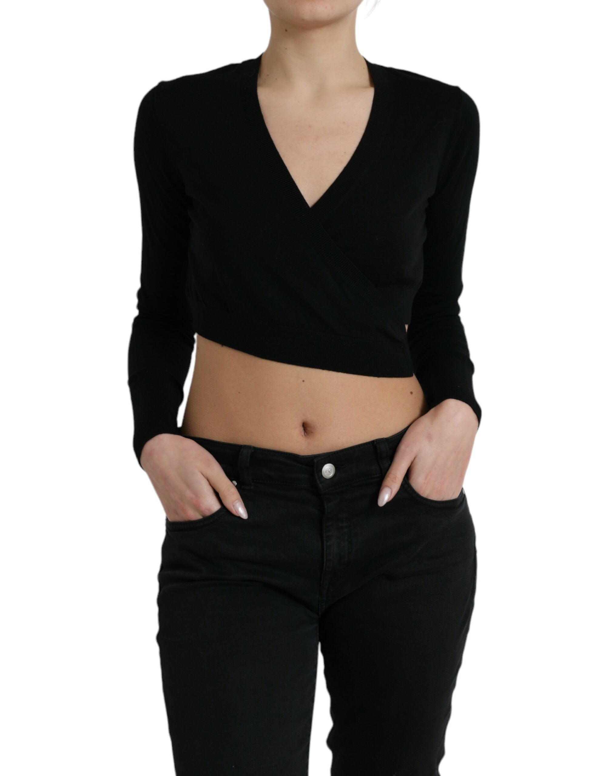 Black wool V-neck crossed cardigan sweater by Dolce & Gabbana displayed on a hanger with detailed knit texture.