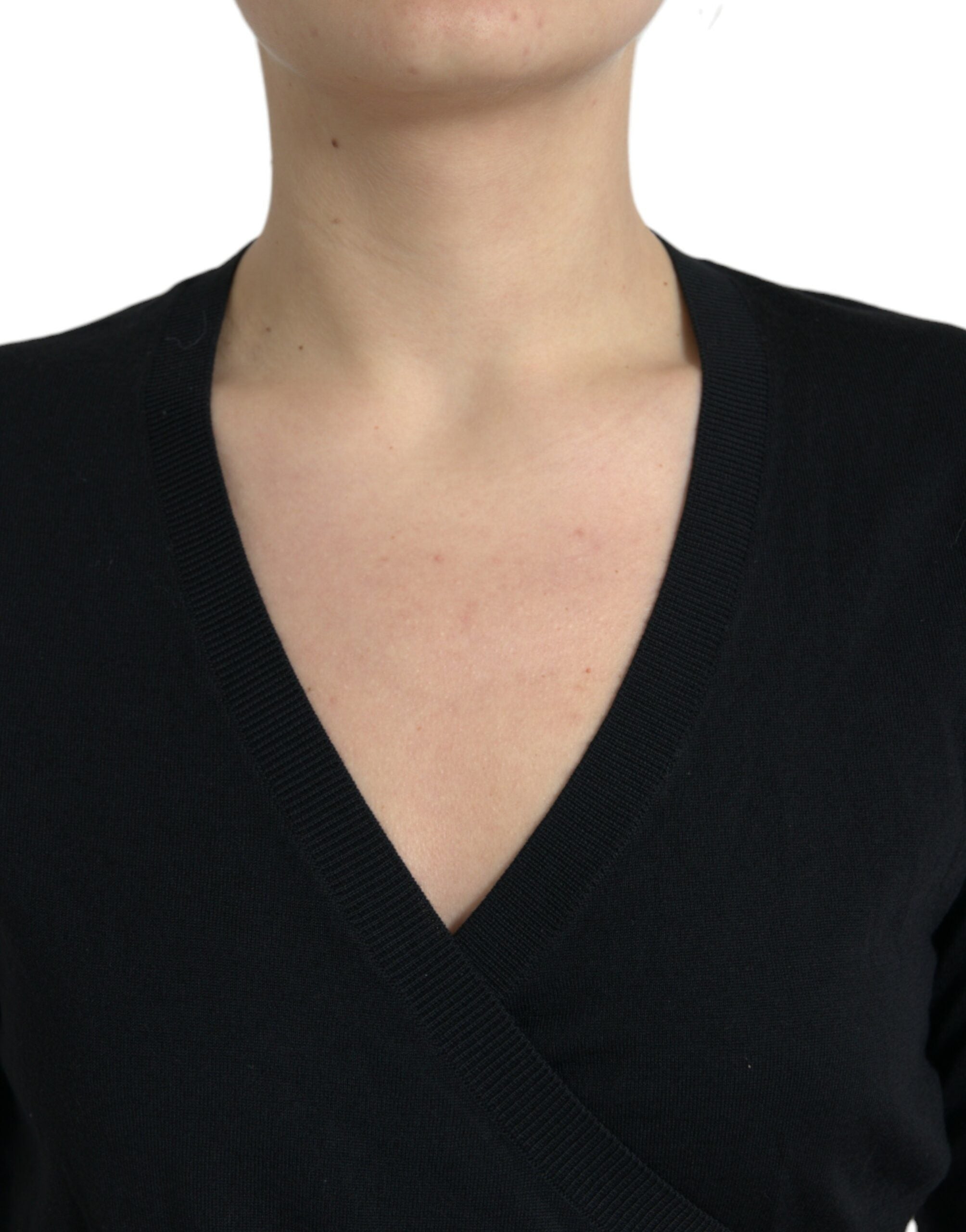 Black wool V-neck crossed cardigan sweater by Dolce & Gabbana, featuring a stylish V-neck and crossed front design.