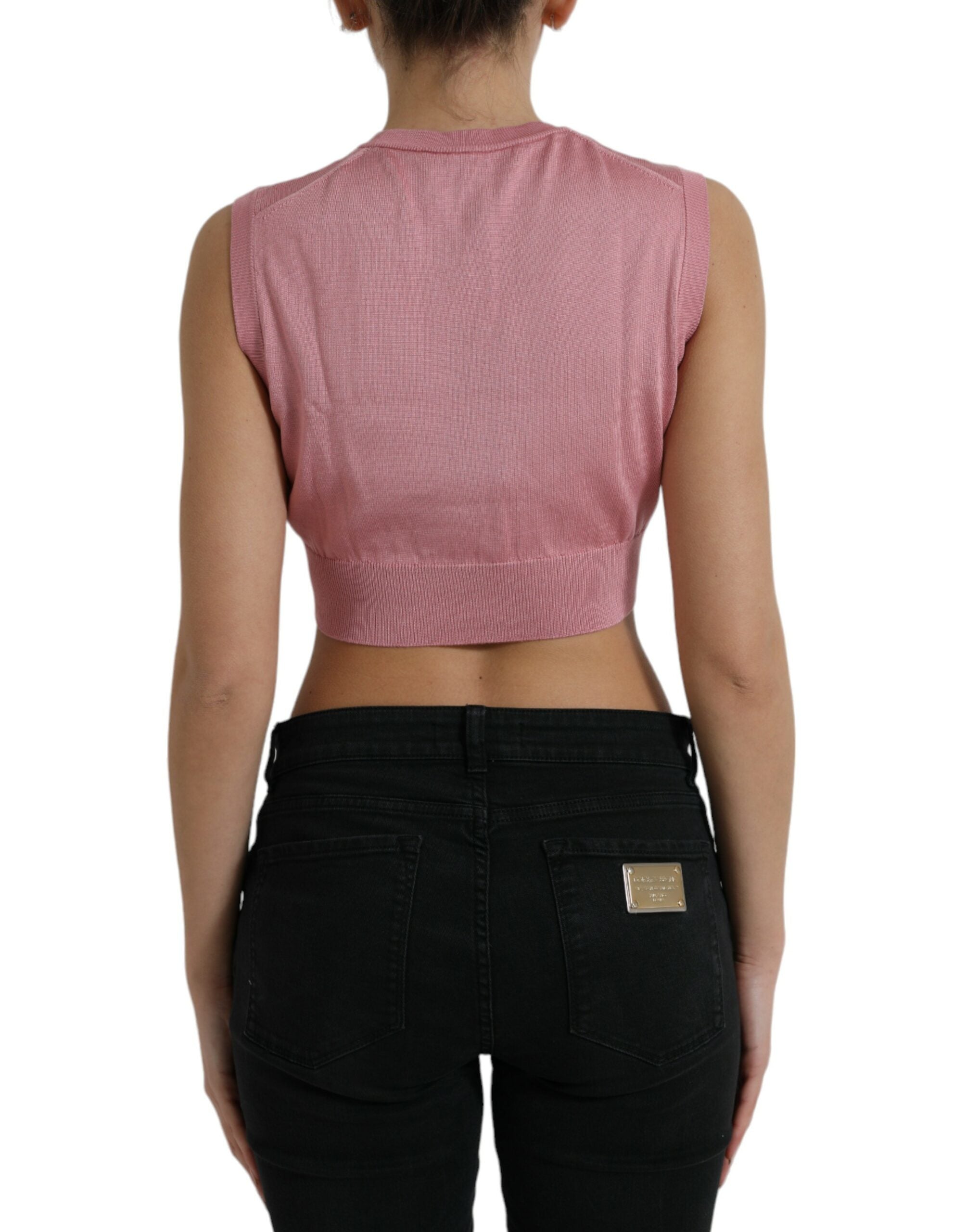 Pink Dolce & Gabbana sleeveless cropped crew neck tank top with fitted design and soft fabric.