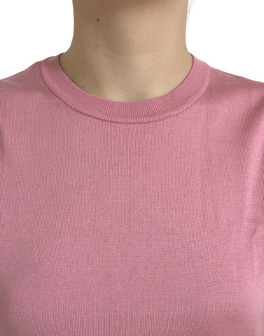 Pink Dolce & Gabbana cropped sleeveless tank top with a crew neck, featuring a fitted design and smooth fabric.