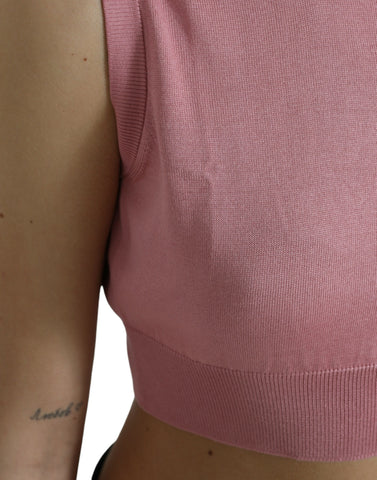 Pink Dolce & Gabbana cropped sleeveless tank top with crew neck, casual and stylish for warm weather.