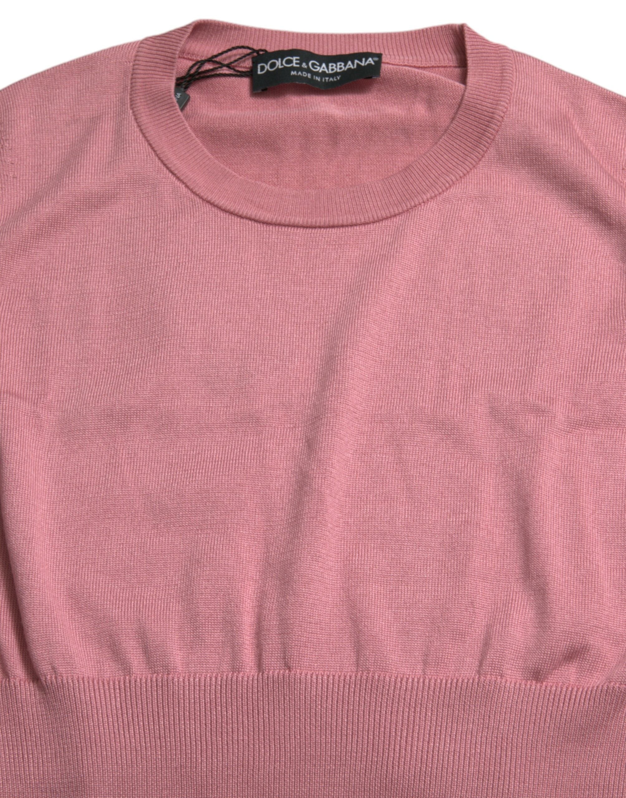 Pink Dolce & Gabbana sleeveless cropped crew neck tank top with a fitted style and minimalist design.