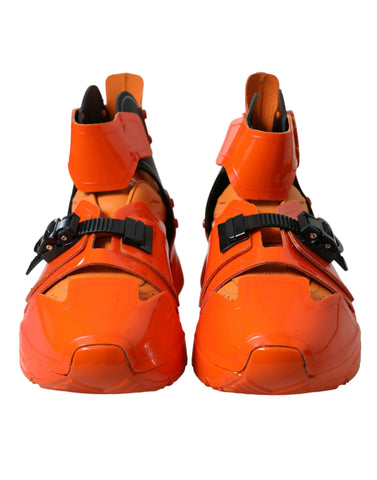 Orange multi-panel chunky high-top sneakers by Dolce & Gabbana with bold design and textured soles.
